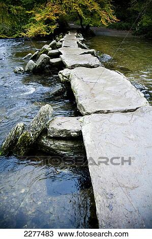 The Tarr Steps, a prehistoric clapper bridge across the River Barle, Exmoor National Park; Somerset, England View Large Photo Image Stock Image - The Tarr Steps, a prehistoric clapper bridge across the River Barle, Exmoor National Park; Somerset, England. Fotosearch