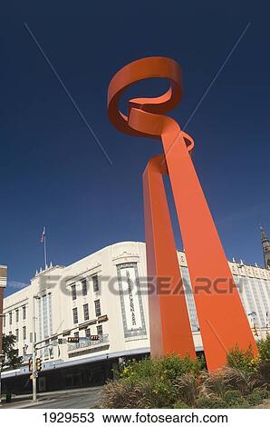Stock Image - The Torch of Friendship with the Rivercenter behind, San Antonio, Texas, USA. Fotosearch