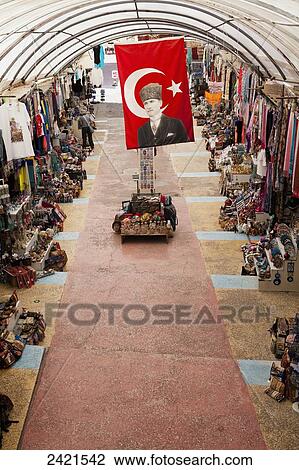 Stock Image - The turkish flag hangs in a market; Goreme, Cappadocia, Turkey. Fotosearch