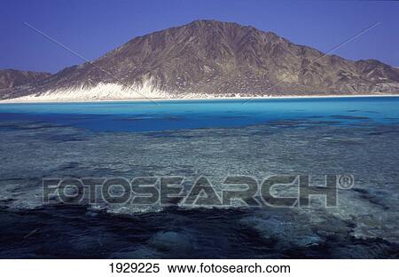 Stock Photography - The turquoise waters of the lagoon inside the drop-off., Zabargad Island, Red Sea, Egypt. Fotosearch