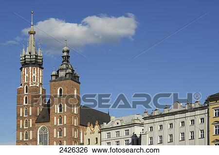 Stock Photograph - The twin towers of St. Mary's Basilica, Old Town Square; Krakow, Poland. Fotosearch