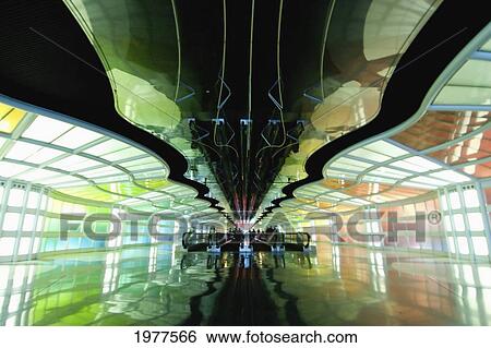 Stock Photograph - The United Terminal C Walkway At The Chicago O'hare Airport; Chicago Illinois United States Of America. Fotosearch