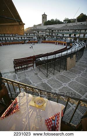 Stock Image - The View Over The Balcony Of The Restaurant, Horno Romano, Overlooking Plaza Mayor, The Bullring In Chinchon, South Of Madrid, Spain.. Fotosearch