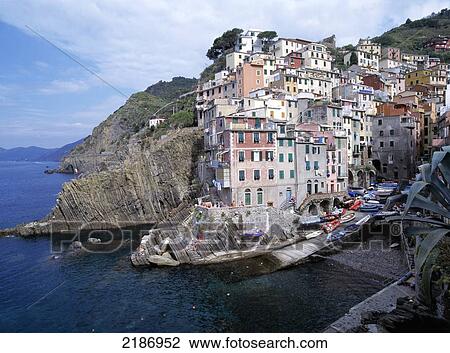 The village of Riomaggiore, Cinque Terre; Riomaggiore, Ligurian Coast, Italy View Large Photo Image Stock Image - The village of Riomaggiore, Cinque Terre; Riomaggiore, Ligurian Coast, Italy. Fotosearch