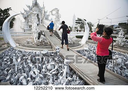 The Wat Rong Khun temple, or White Temple; Chaing Rai, Thailand View Large Photo Image Stock Image - The Wat Rong Khun temple, or White Temple; Chaing Rai, Thailand. Fotosearch