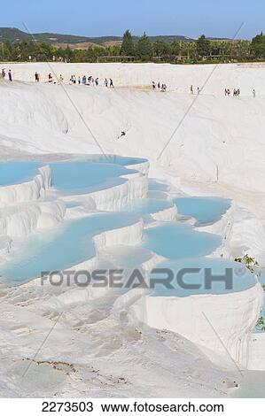 The white travertine limestone terraces and pools pamukkale is known as the cotton castle; pamukkale denizli province turkey View Large Photo Image Stock Image - The white travertine limestone terraces and pools pamukkale is known as the cotton castle; pamukkale denizli province turkey. Fotosearch