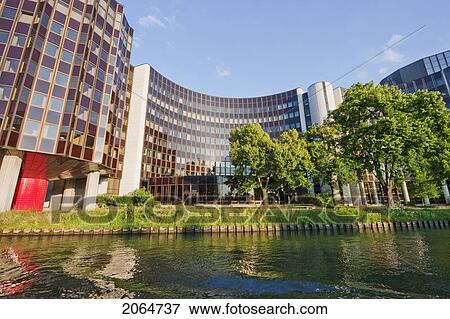 The Winston Churchill Building Of The European Parliament On The Banks Of The Ill River, Strasbourg, France View Large Photo Image Stock Photo - The Winston Churchill Building Of The European Parliament On The Banks Of The Ill River, Strasbourg, France. Fotosearch