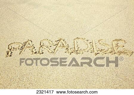 Stock Photo - The word paradise written in the sand; Hawaii, United States of America. Fotosearch