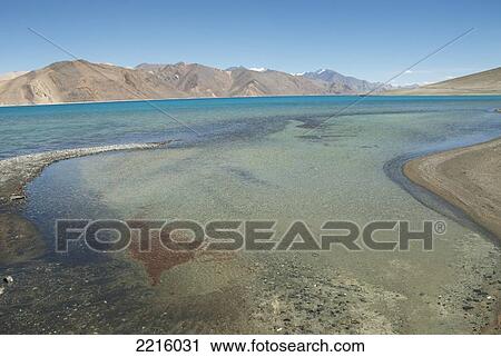 Stock Image - Thikse Monastery Is Built Up A Hillside In Ladhak. It Was Founded In 1433 C. E., Pangong Lake, India. Fotosearch