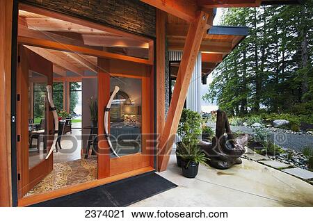 Stock Image - This Ocean-Side Home Features Views Of The Open Water; Port Renfrew, Vancouver Island, British Columbia, Canada. Fotosearch