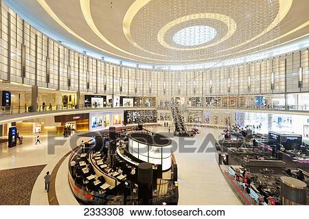 Stock Photo - Thousands Of White Plastic Butterflies Hanging From The Ceiling, Fashion Island, Dubai Mall; Dubai, United Arab Emirates. Fotosearch