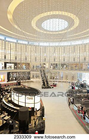 Stock Photo - Thousands Of White Plastic Butterflies Hanging From The Ceiling, Fashion Island, Dubai Mall; Dubai, United Arab Emirates. Fotosearch