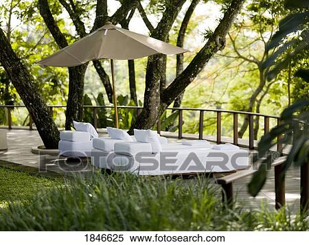 Stock Photography - Three Beds On Terrace. Fotosearch