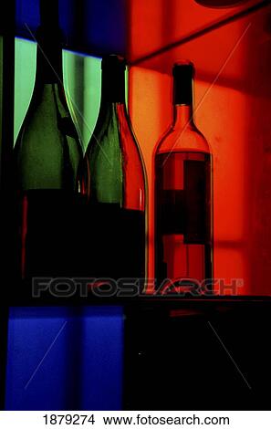 Three Bottles In A Bar, Close Up View Large Photo Image Picture - Three Bottles In A Bar, Close Up. Fotosearch