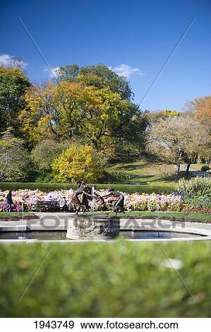 Stock Photo - Three Dancing Maidens Sculpture In Central Park Conservatory Garden; New York City New York United States Of America. Fotosearch