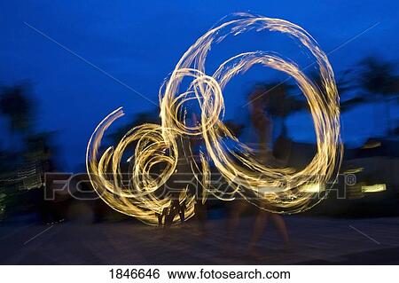 Three Fire-Twirlers Performing View Large Photo Image Stock Photograph - Three Fire-Twirlers Performing. Fotosearch
