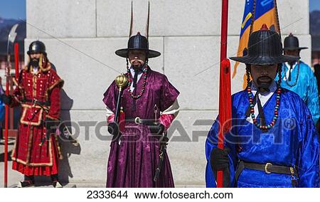 Three Guards Stand Watch During The Ceremonial Guard Change At Gyeongbokgung; Seoul, South Korea View Large Photo Image Picture - Three Guards Stand Watch During The Ceremonial Guard Change At Gyeongbokgung; Seoul, South Korea. Fotosearch