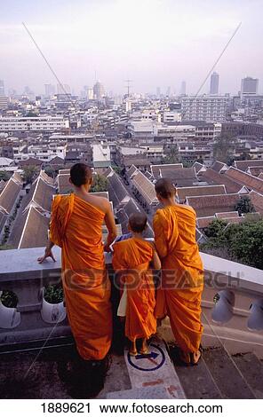Three Monks Standing Infront Of Bangkok Skyline View Large Photo Image Stock Image - Three Monks Standing Infront Of Bangkok Skyline. Fotosearch
