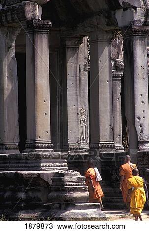 Three Monks Walking Into Angkor Wat View Large Photo Image Stock Image - Three Monks Walking Into Angkor Wat. Fotosearch
