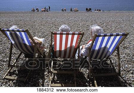 Three Old Woman On Deckchairs On Pebble Beach View Large Photo Image Stock Image - Three Old Woman On Deckchairs On Pebble Beach. Fotosearch