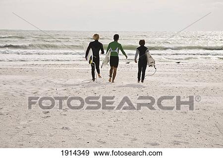 Three Surfers On Lido Beach View Large Photo Image Stock Photo - Three Surfers On Lido Beach. Fotosearch