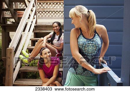 Three Young Female Friends On Wooden Steps; California, Usa View Large Photo Image Stock Image - Three Young Female Friends On Wooden Steps; California, Usa. Fotosearch