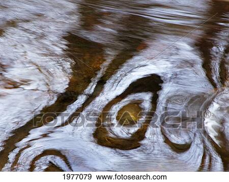 Stock Photo - Thunder, Massachusetts, Seekonk, Caratunk Wildlife Refuge, Ripples And Reflections On Water Surface.. Fotosearch