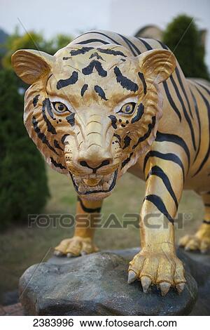 Tiger statue at the Buddhist temple; Thaton, Chiang Rai, Thailand View Large Photo Image Stock Photograph - Tiger statue at the Buddhist temple; Thaton, Chiang Rai, Thailand. Fotosearch