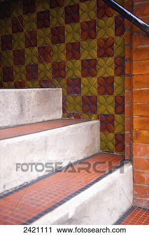 Tile on steps and colourful tile with a floral pattern on the wall; London, England View Large Photo Image Stock Image - Tile on steps and colourful tile with a floral pattern on the wall; London, England. Fotosearch