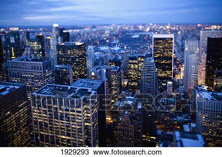 Stock Image - Tilt shift evening image of Manhattan from the top of the Rockefeller centre, New York. USA.. Fotosearch