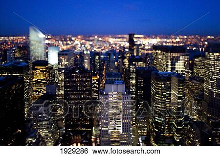 Stock Photograph - Tilt shift evening image of Manhattan from the top of the Rockefeller centre, New York. USA.. Fotosearch