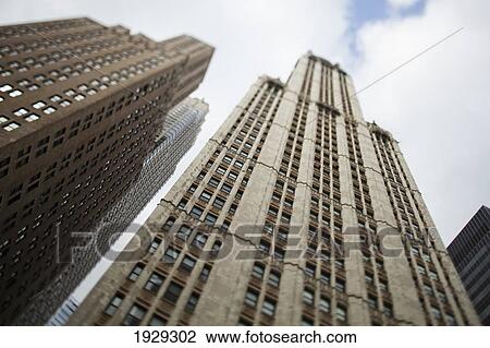 Tilt shift lens image - looking up at Sykscrapers in Manhattan, New York. USA. View Large Photo Image Stock Image - Tilt shift lens image - looking up at Sykscrapers in Manhattan, New York. USA.. Fotosearch