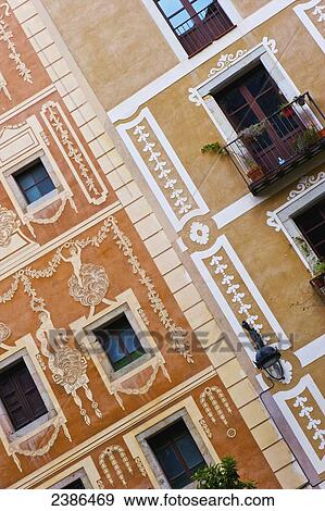 Tilted view of the ornate facade of a residential building; Barcelona, Spain View Large Photo Image Stock Photo - Tilted view of the ornate facade of a residential building; Barcelona, Spain. Fotosearch