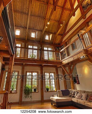 Stock Photo - Timber frame log home at Hummingbird Retreat Centre; St. Etienne de Bolton, Quebec, Canada. Fotosearch