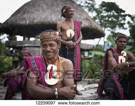 Timorese men in traditional attire at Liurai Village; Timor-Leste View Large Photo Image Stock Photo - Timorese men in traditional attire at Liurai Village; Timor-Leste. Fotosearch