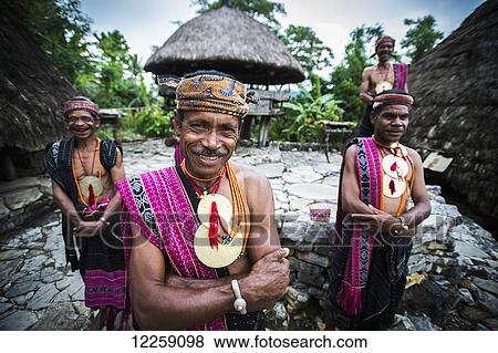 Timorese men in traditional attire at Liurai Village; Timor-Leste View Large Photo Image Stock Photo - Timorese men in traditional attire at Liurai Village; Timor-Leste. Fotosearch