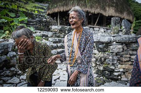 Timorese woman laughing at Liurai Village; Timor-Leste View Large Photo Image Stock Image - Timorese woman laughing at Liurai Village; Timor-Leste. Fotosearch