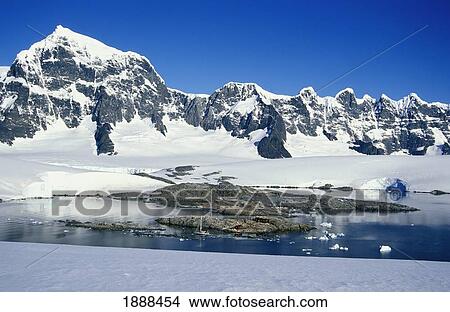 Tiny Hut And Boat And Large Mountains With Snow View Large Photo Image Picture - Tiny Hut And Boat And Large Mountains With Snow. Fotosearch