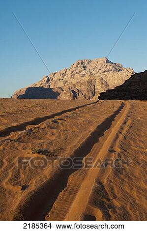 Tire Tracks In The Early Morning, Wadi Rum, Jordan, Middle East View Large Photo Image Picture - Tire Tracks In The Early Morning, Wadi Rum, Jordan, Middle East. Fotosearch