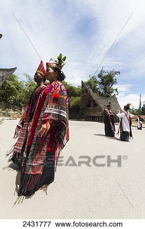 Toba Batak people performing a traditional Batak dance at Huta Bolon Museum in Simanindo village on Samosir Island, Lake Toba, North Sumatra, Indonesia View Large Photo Image Stock Photo - Toba Batak people performing a traditional Batak dance at Huta Bolon Museum in Simanindo village on Samosir Island, Lake Toba, North Sumatra, Indonesia. Fotosearch