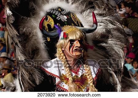 Tobas Dancer Wearing An Elaborate Mask, Feather Headdress And Costume In The Procession Of The Carnaval De Oruro, Oruro, Bolivia View Large Photo Image Stock Image - Tobas Dancer Wearing An Elaborate Mask, Feather Headdress And Costume In The Procession Of The Carnaval De Oruro, Oruro, Bolivia. Fotosearch