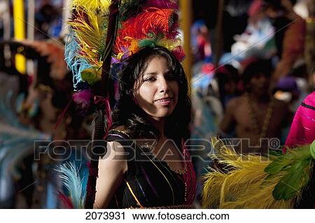 Tobas Dancer Wearing An Elaborate Feather Headdress And Costume In The Procession Of The Carnaval De Oruro, Oruro, Bolivia View Large Photo Image Stock Image - Tobas Dancer Wearing An Elaborate Feather Headdress And Costume In The Procession Of The Carnaval De Oruro, Oruro, Bolivia. Fotosearch