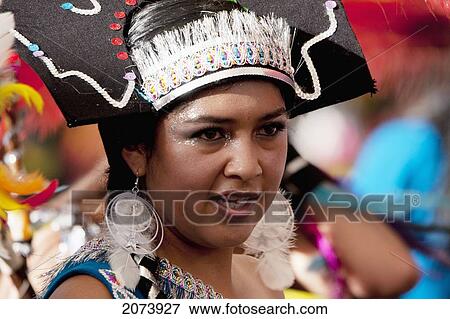 Tobas Dancer Wearing An Elaborate Feather Headdress And Costume In The Procession Of The Carnaval De Oruro, Oruro, Bolivia View Large Photo Image Stock Photo - Tobas Dancer Wearing An Elaborate Feather Headdress And Costume In The Procession Of The Carnaval De Oruro, Oruro, Bolivia. Fotosearch