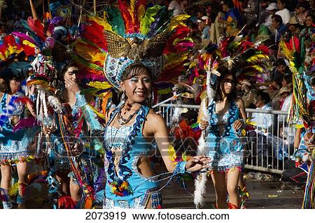 Tobas Dancers Wearing Elaborate Feather Headdresses And Costumes In The Procession Of The Carnaval De Oruro, Oruro, Bolivia View Large Photo Image Stock Photo - Tobas Dancers Wearing Elaborate Feather Headdresses And Costumes In The Procession Of The Carnaval De Oruro, Oruro, Bolivia. Fotosearch