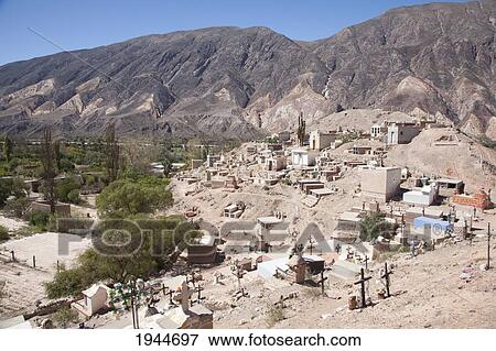Stock Photo - Tombs at the hillside cemetery of Maimara, Jujuy, Argentina. Fotosearch