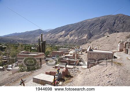 Stock Photo - Tombs at the hillside cemetery of Maimara, Jujuy, Argentina. Fotosearch