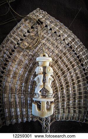 Stock Image - Tongan artifact made from whalebone; Tongatapu, Tonga. Fotosearch