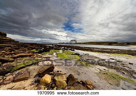 Stock Photography - Torness Nuclear Power Station At The Water's Edge In The Distance; Lothian Scotland. Fotosearch