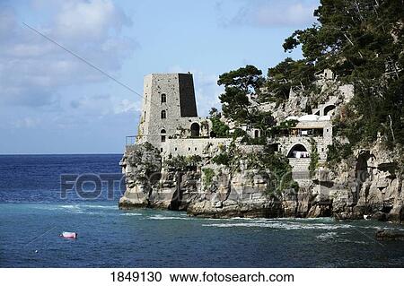 Stock Image - Torre Clavel, Positano, Amalfi Coast, Italy; Seascape With Waterfront Buildings. Fotosearch