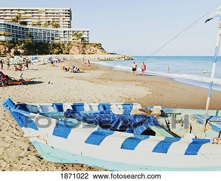 Stock Image - Torremolinos, Costa Del Sol, Malaga, Spain; La Carihuela Beach And Castillo De Santa Clara Apartments. Fotosearch